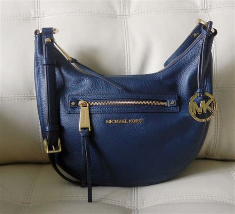 michael kors rhea leather handbag front zipper|Michael Kors rhea zip.